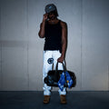 Black handmade cowhide leather bag worn on model – Reflejos Smash & Grab